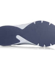Navy blue and white lawn bowls shoe sole on a white background