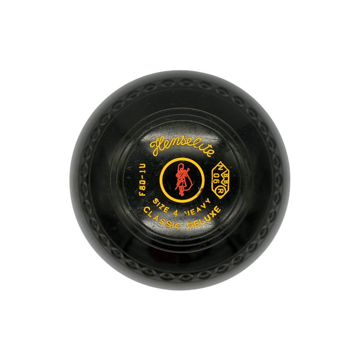Black Second hand Henselite lawn bowl with yellow text and logo on a white background